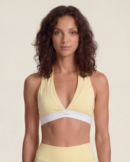 Load image 1 in gallery view. Double Take Sports Bra in Soft Yellow