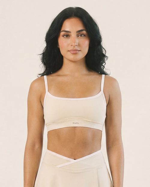 Load image 1 in gallery view. Muse Sports Bra in Light Sandstone