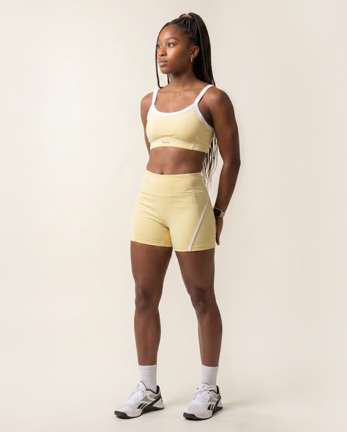 Load image 1 in gallery view. Serena Sports Bra in Soft Yellow