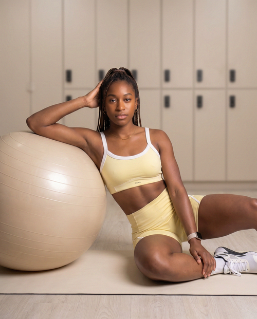 Load image 1 in gallery view. Serena Sports Bra in Soft Yellow